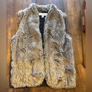 Faux Brown Fur Vest with pockets.